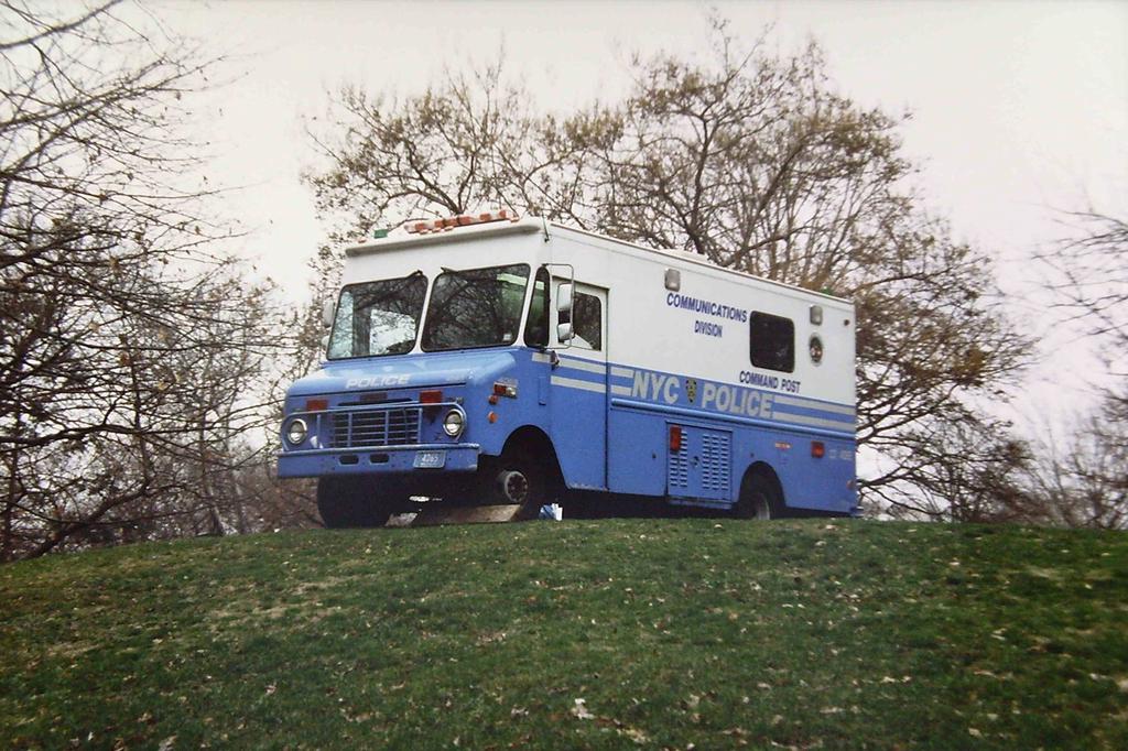 A blue police truck